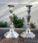 Magnificent pair of silver candlesticks.