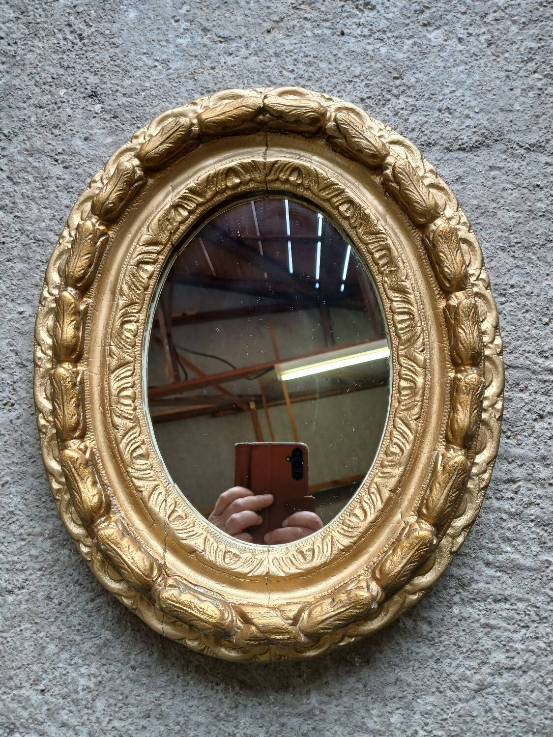 Miroir ancien en bois doré