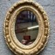 Miroir ancien en bois doré