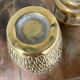 Duo of embossed brass vases
