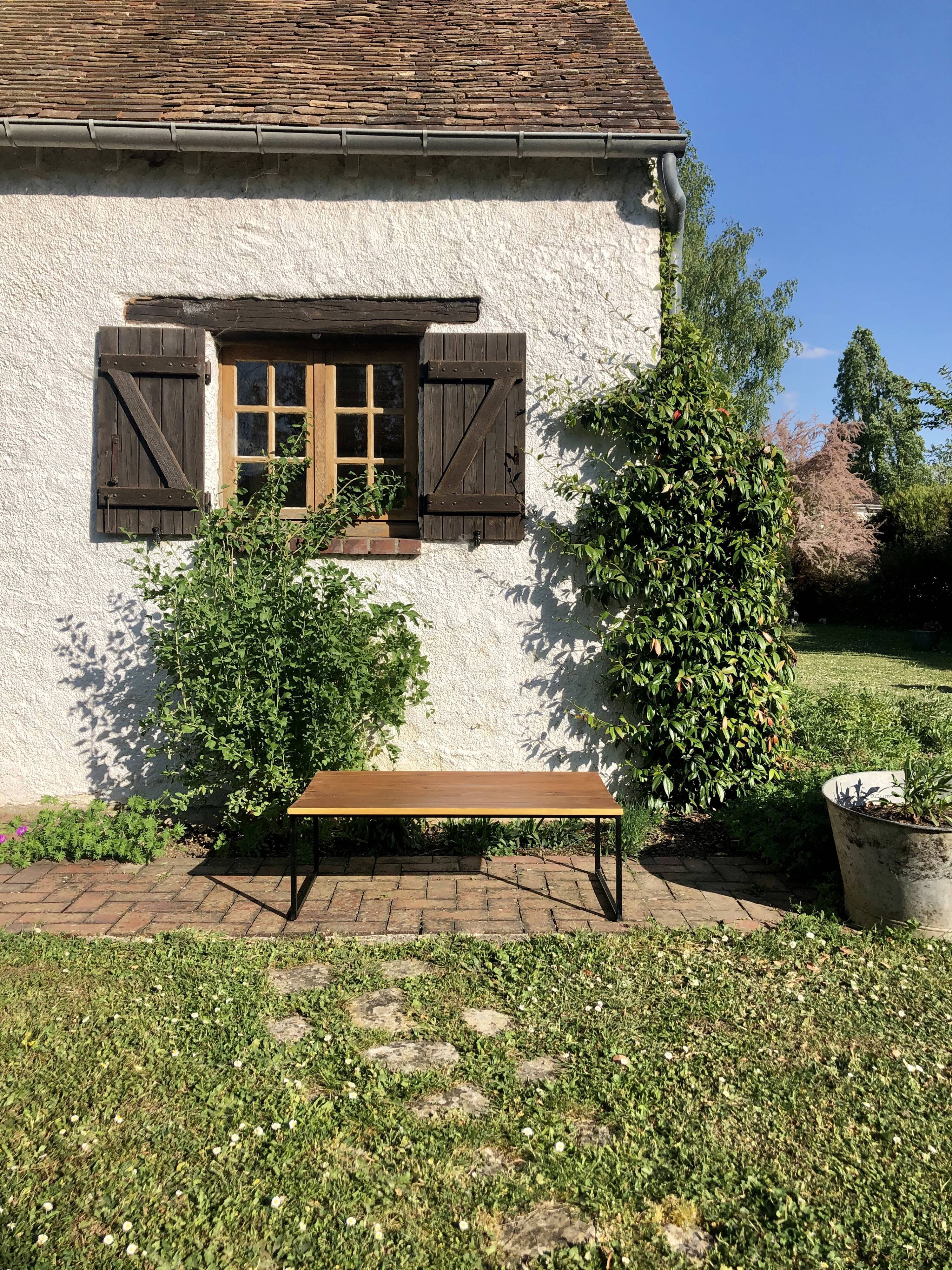 Waxed wood coffee table, black metal and mustard