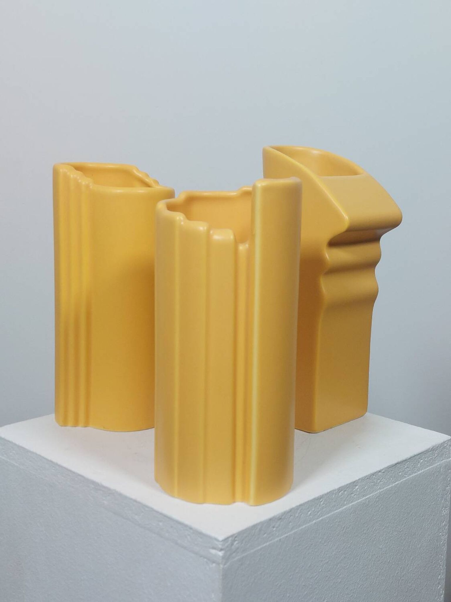 Three yellow vases in Memphis style by ASA Germany.