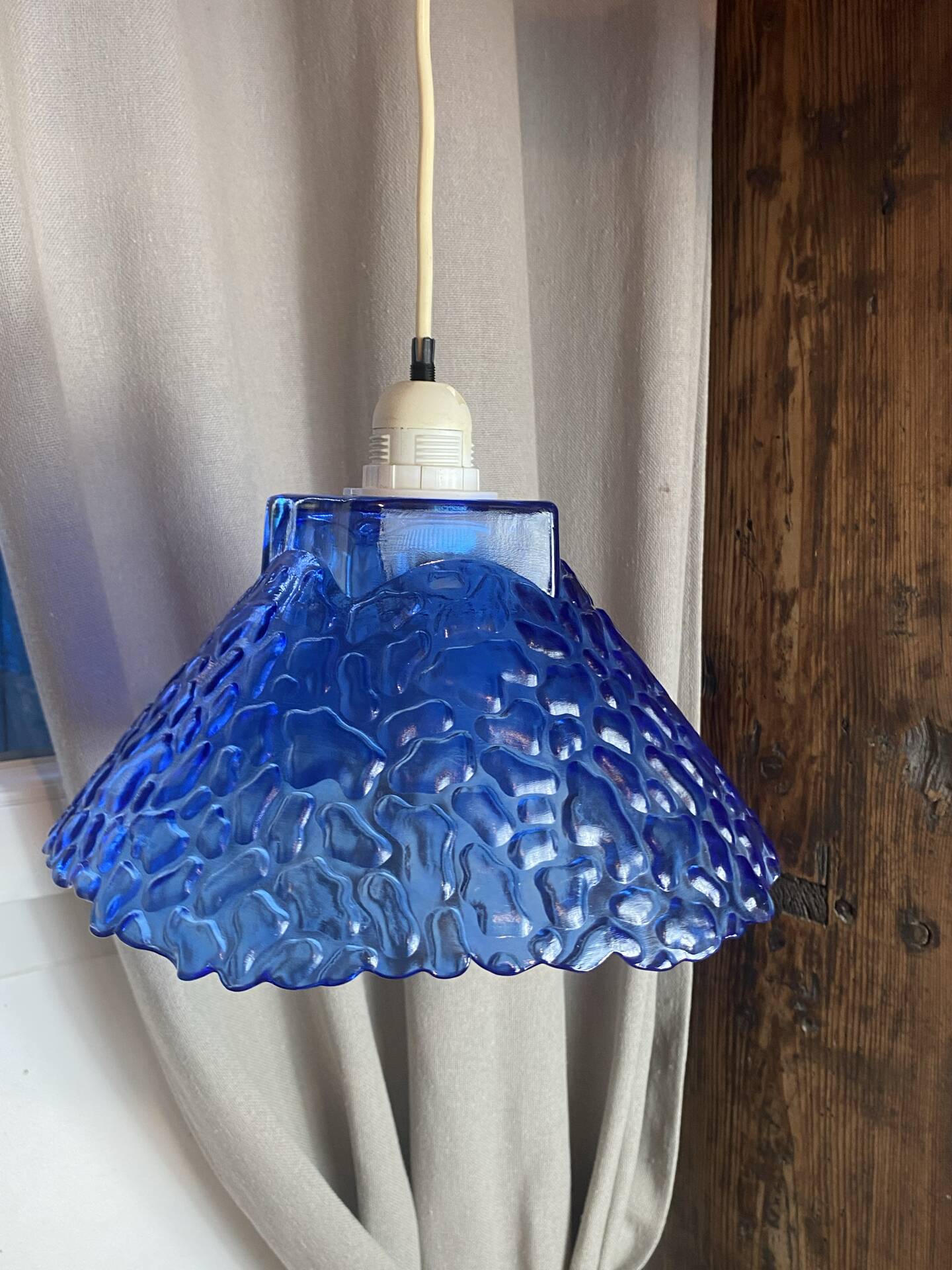 Blue moulded glass suspension