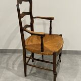 Provencal style straw armchair sometimes called marsh armchair