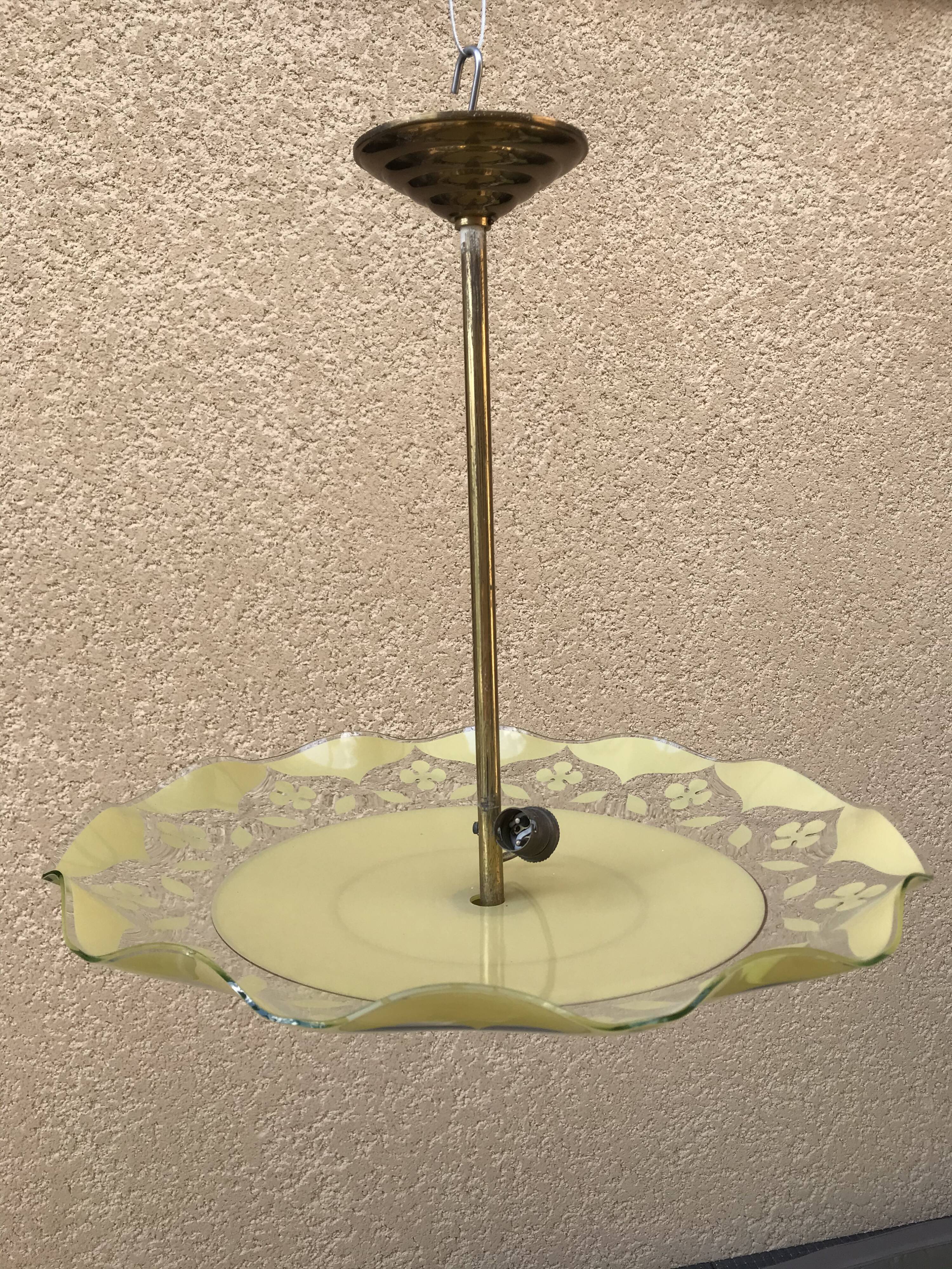 Brass and yellow glass hanging lamp