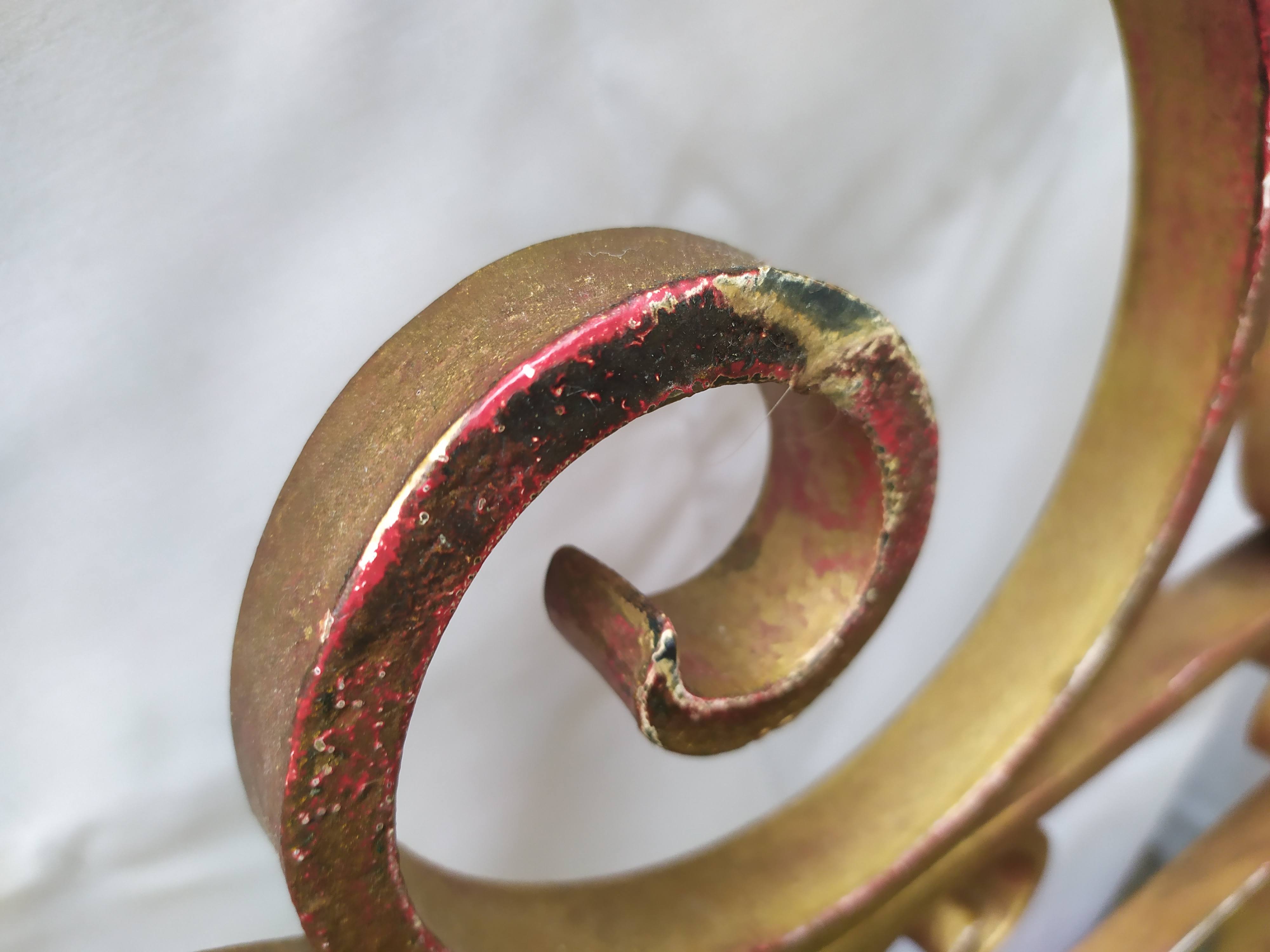 Golden wrought iron bedhead