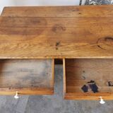 Table in raw oak, countryside.