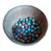 70 terracotta balls and a metal calot