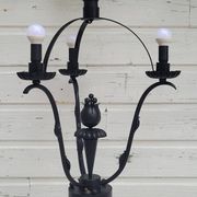 Black wrought iron floor lamp attributed to Gilbert Poillerat