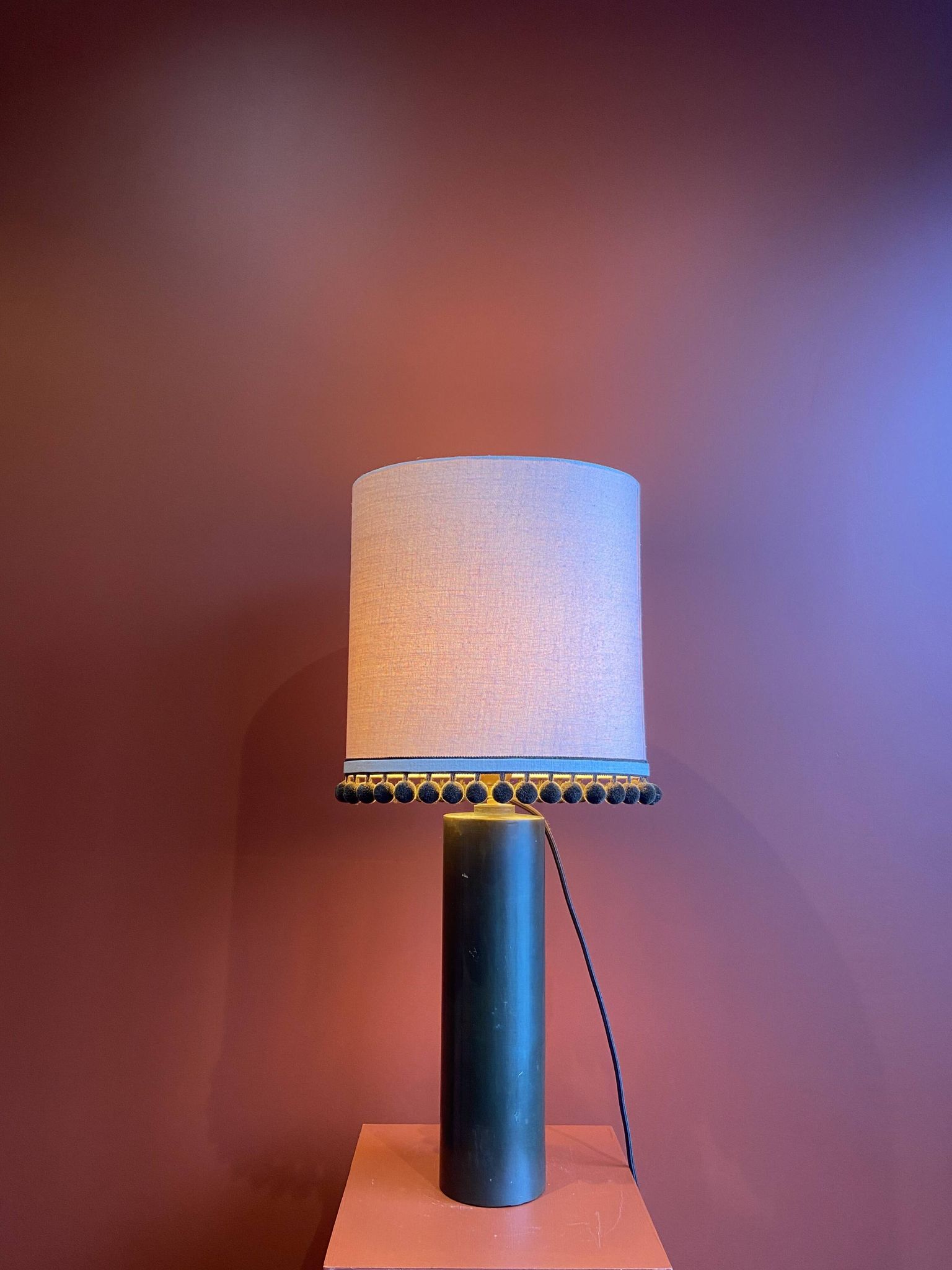 Copper "bouillotte" lamp with Ashoka Silk shade, pom-poms of c