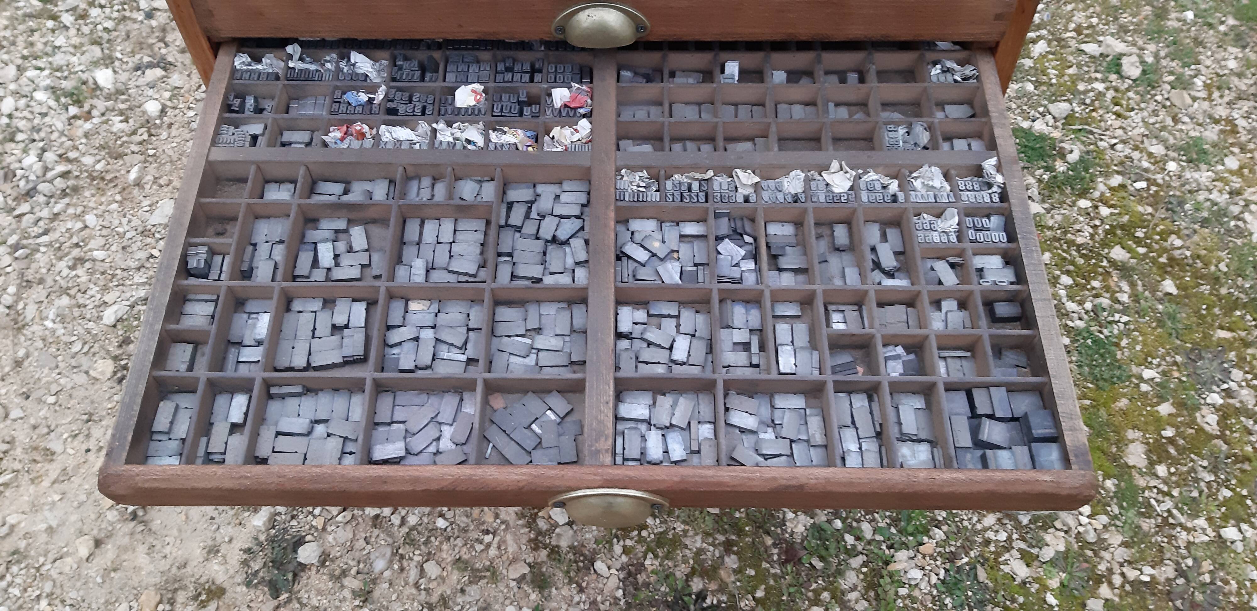 Printing cabinet 16 drawers with these lead letters