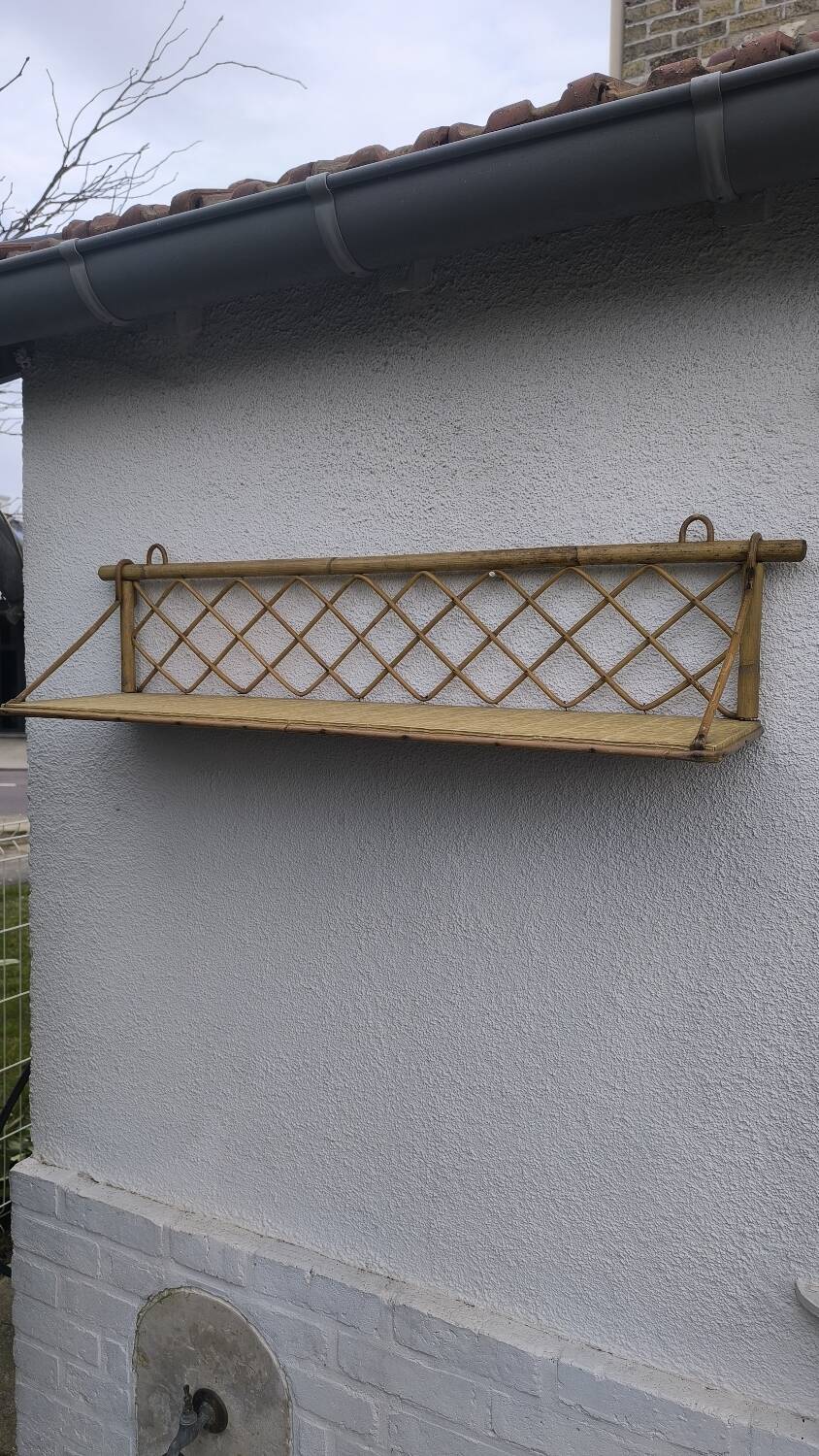 Vintage rattan wall shelf