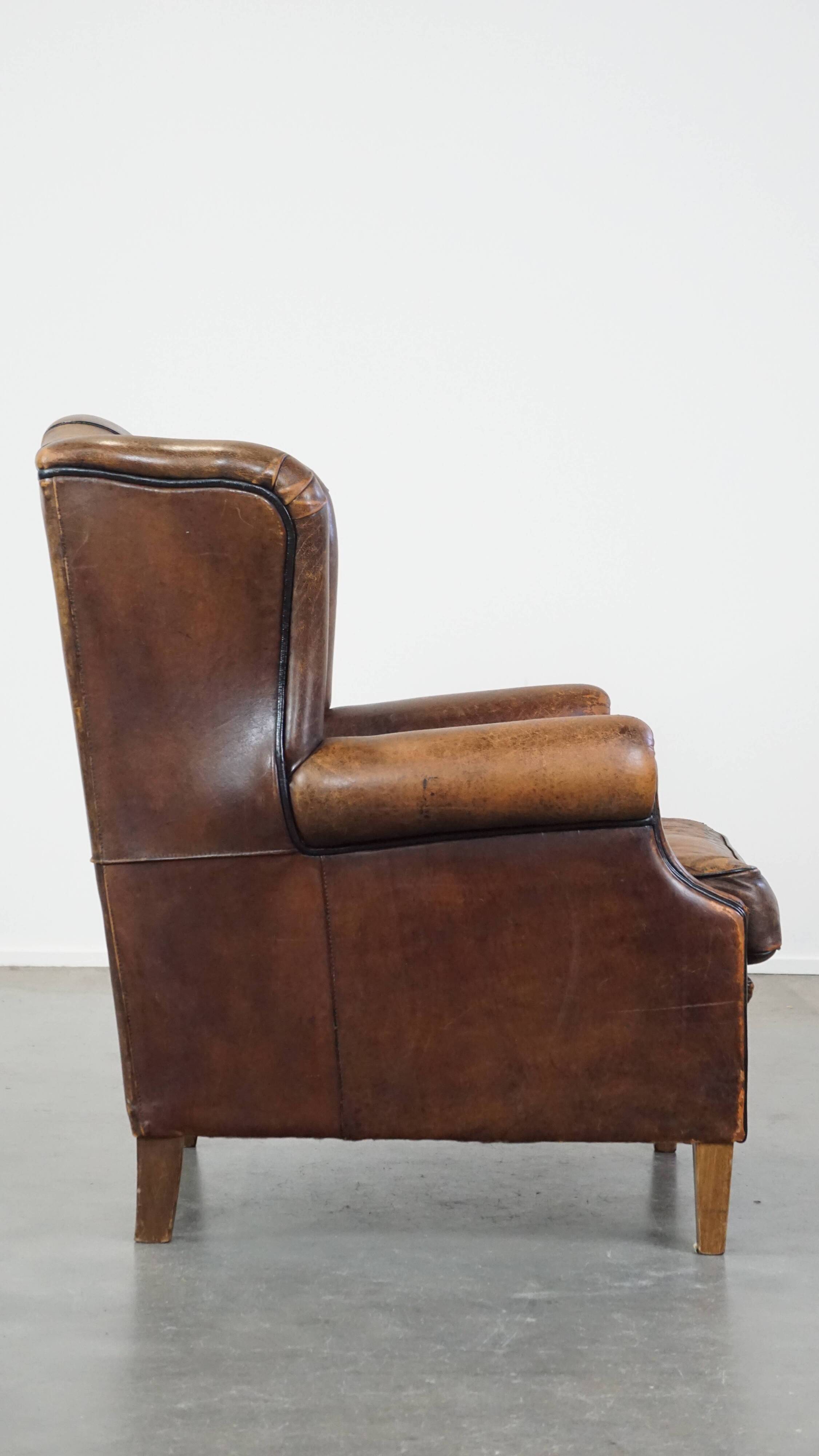 Sheep leather wing chair with patina