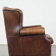 Sheep leather wing chair with patina