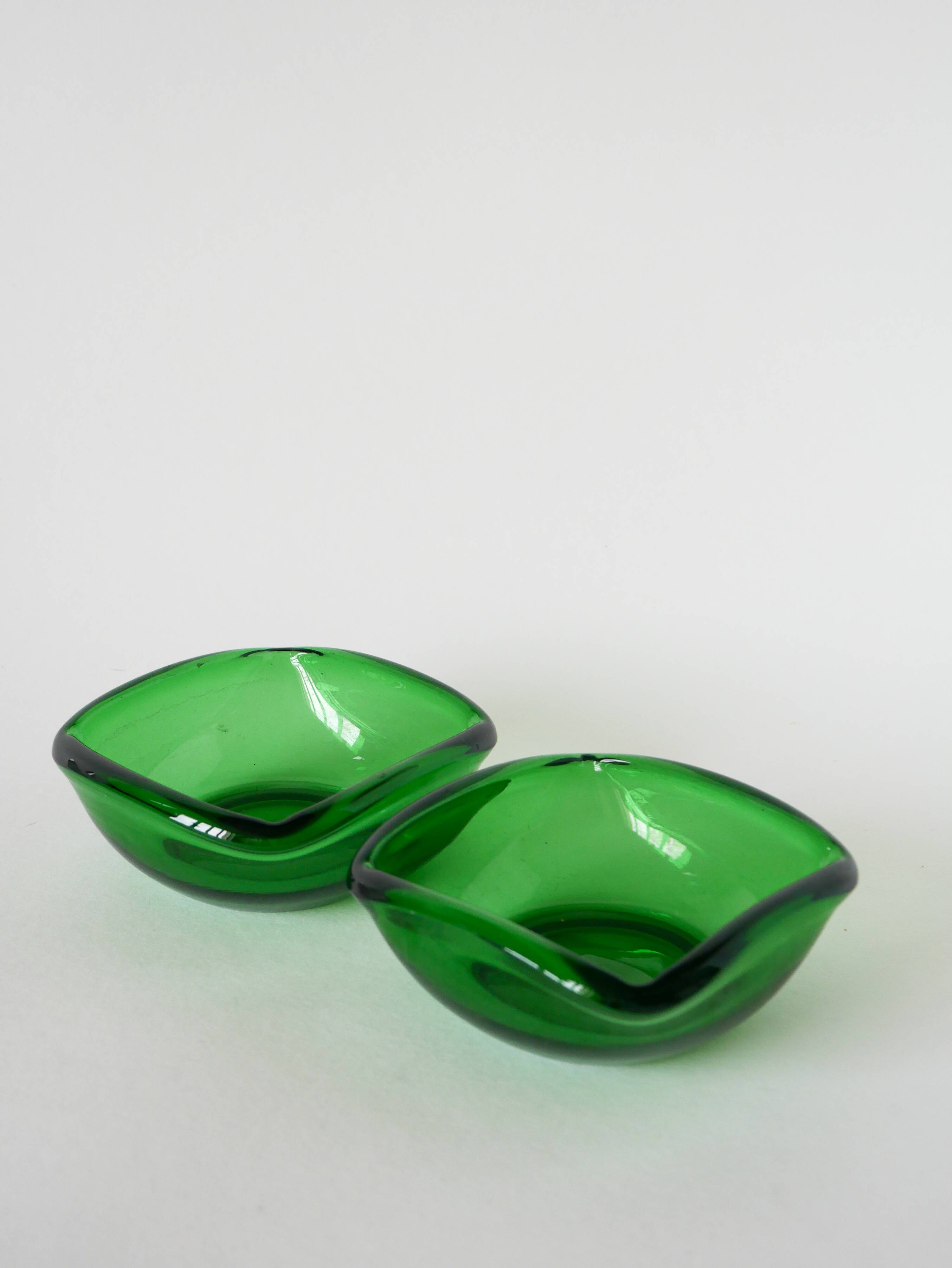 Pair of green colored glass storage compartments, in the Murano style, 1970