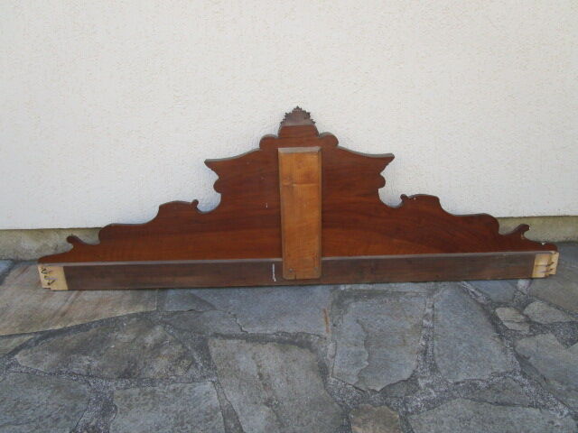 Old wooden pediment