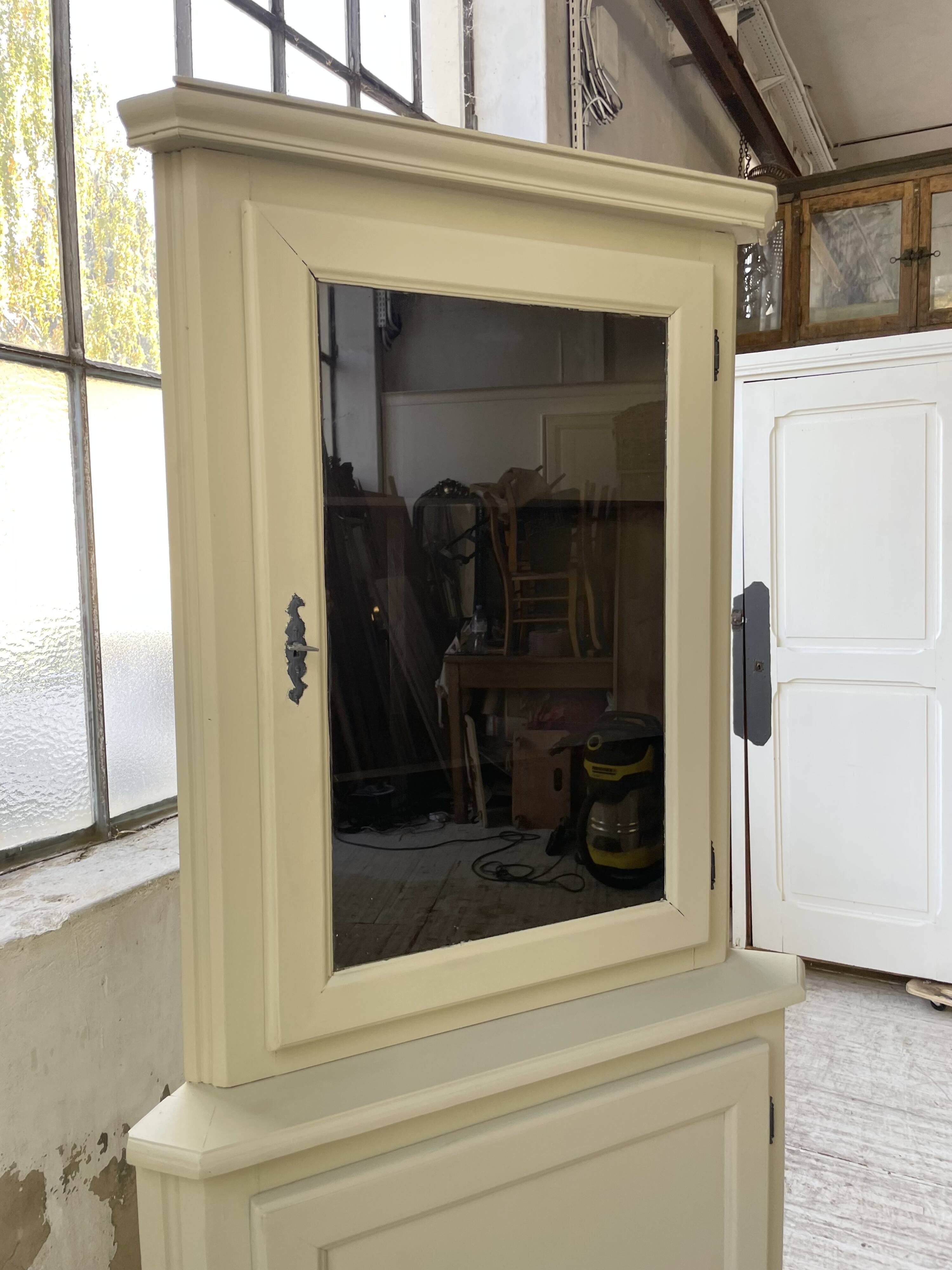 Corner display cabinet from the 1950s