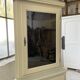 Corner display cabinet from the 1950s