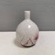A vase in crackled porcelain with pink decoration. Germany 1930s