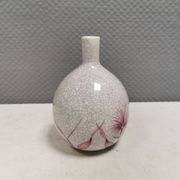 A vase in crackled porcelain with pink decoration. Germany 1930s