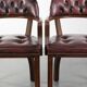 Set of two brown cowhide leather Chesterfield dining chairs