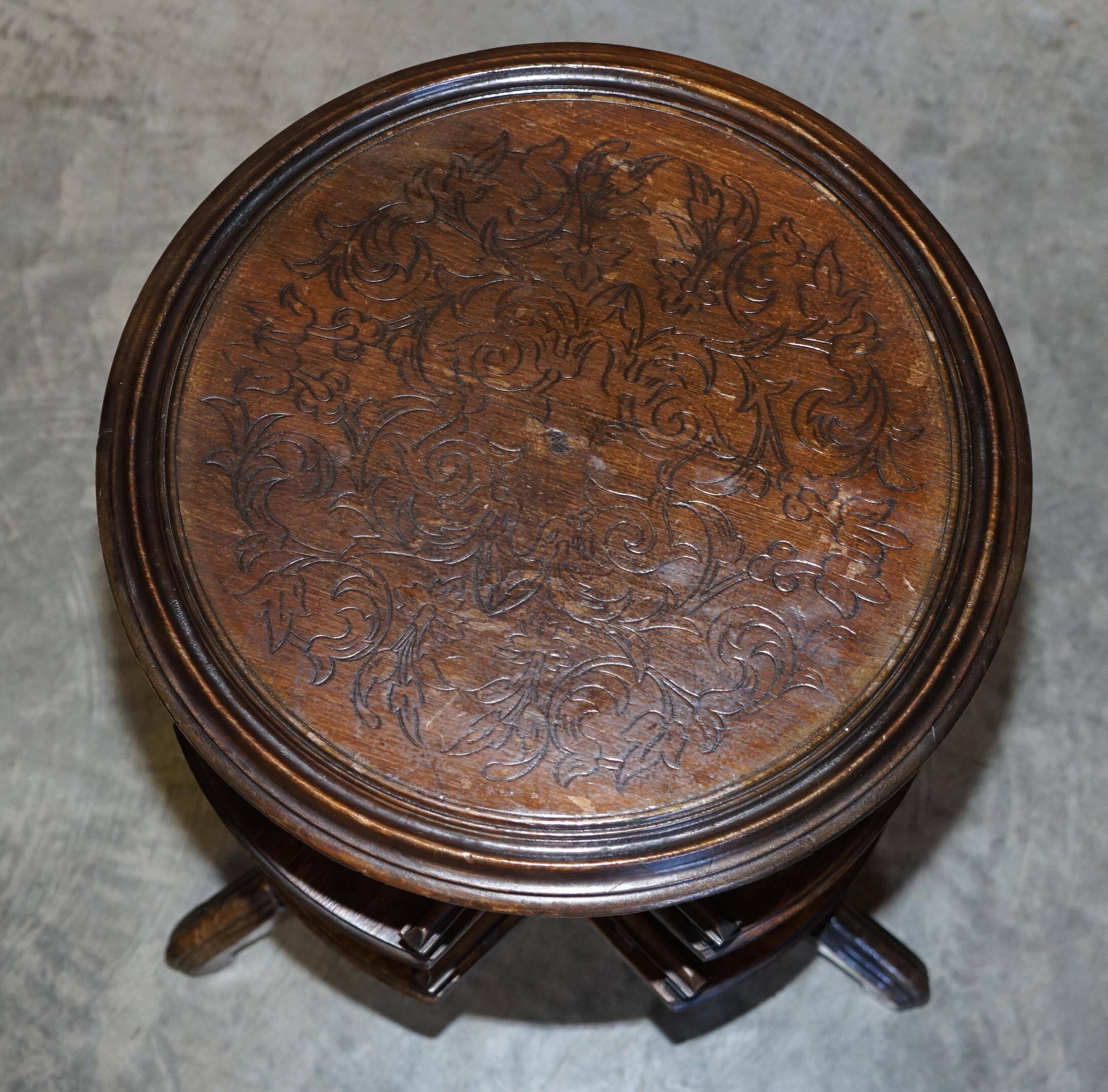 Victorian oak library table, two levels, pokerwork top.