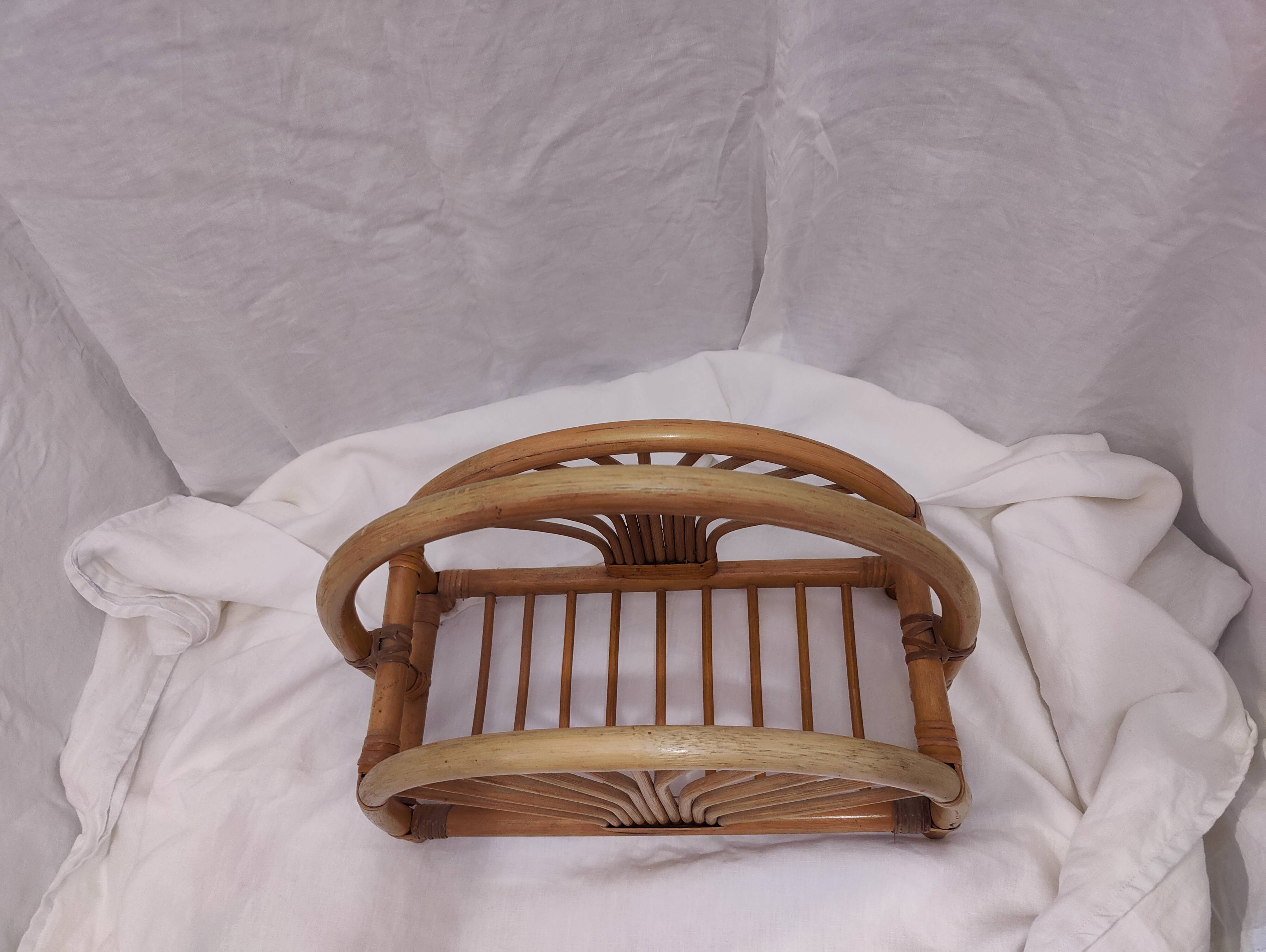 Woven bamboo magazine rack from the 1970s