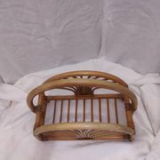 Woven bamboo magazine rack from the 1970s