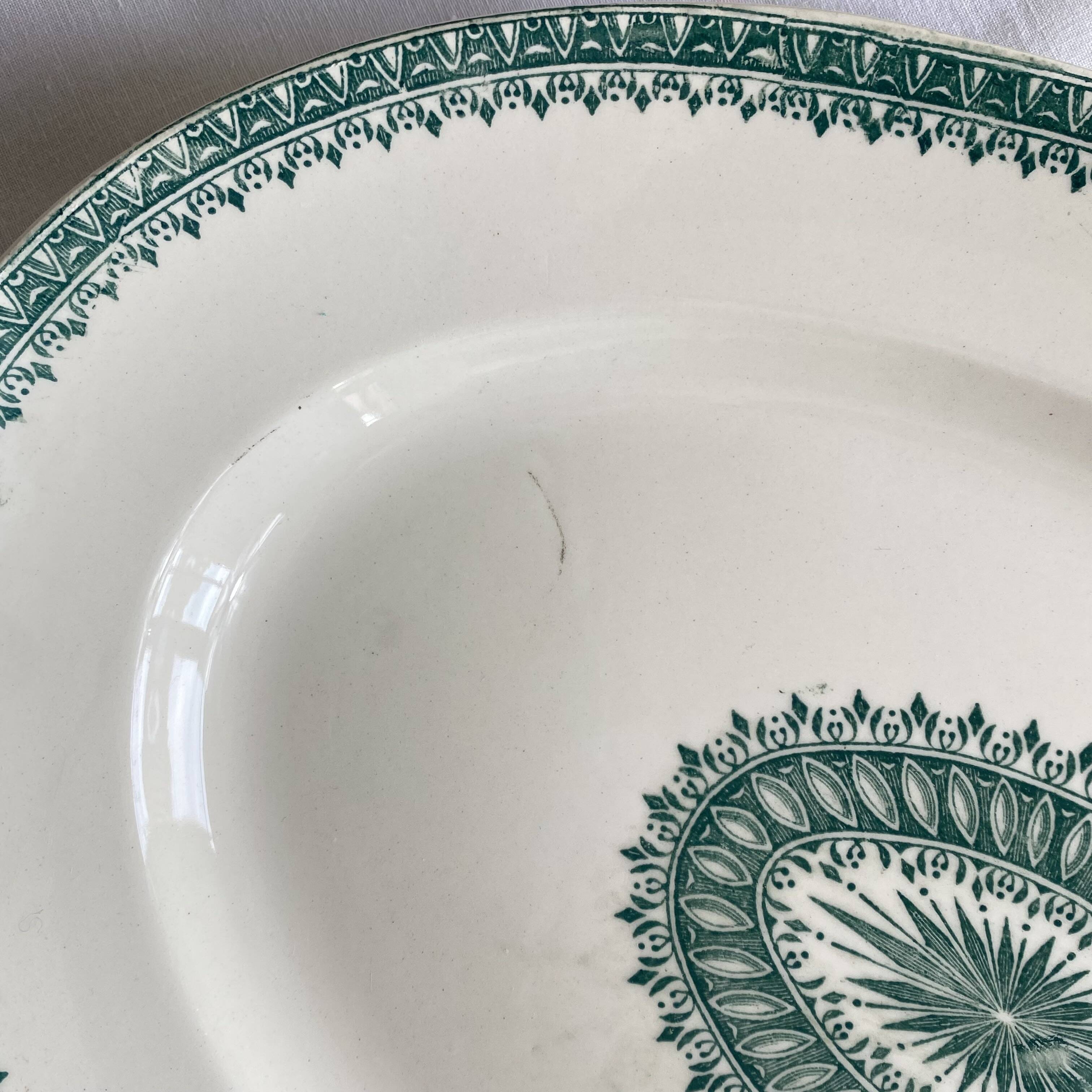 Oval serving dish, antique earthenware from Creil and Montereau.