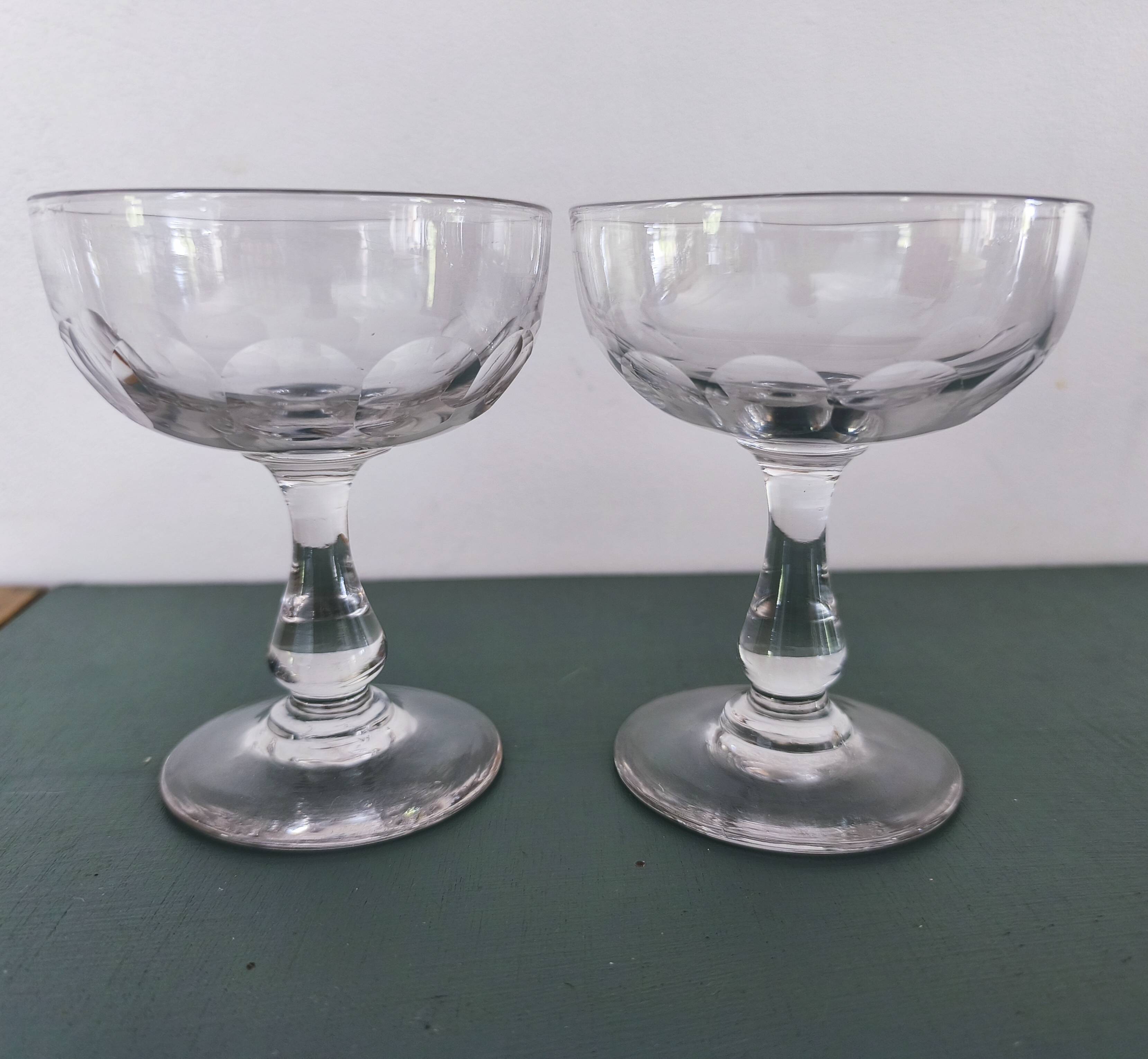 Set of 2 Baccarat crystal champagne glasses.