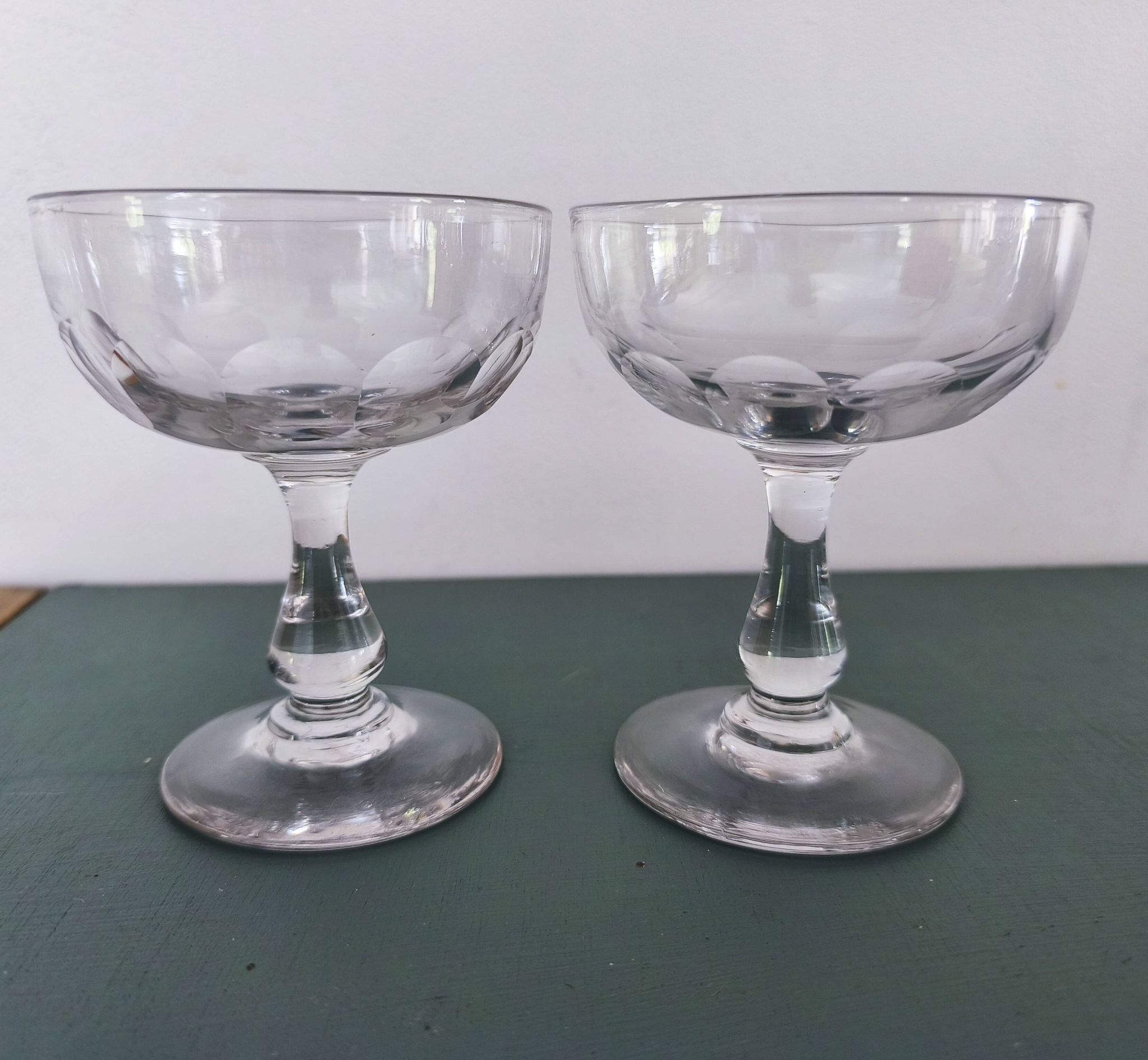 Set of 2 Baccarat crystal champagne glasses.
