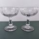 Set of 2 Baccarat crystal champagne glasses.