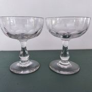 Set of 2 Baccarat crystal champagne glasses.