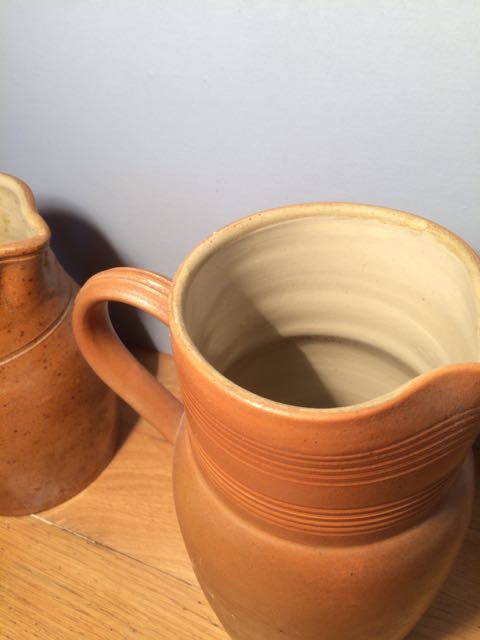 Duo of sandstone jugs