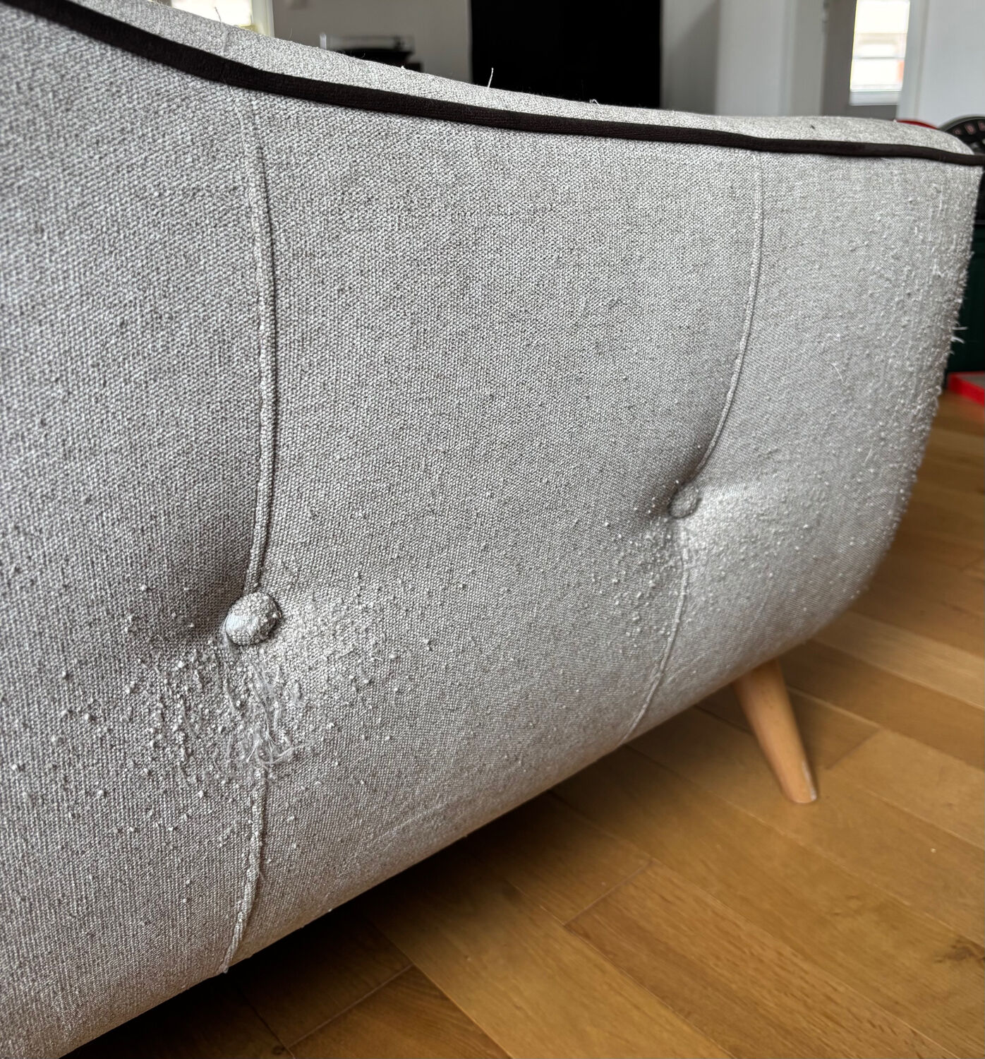 Grey two-seater sofa