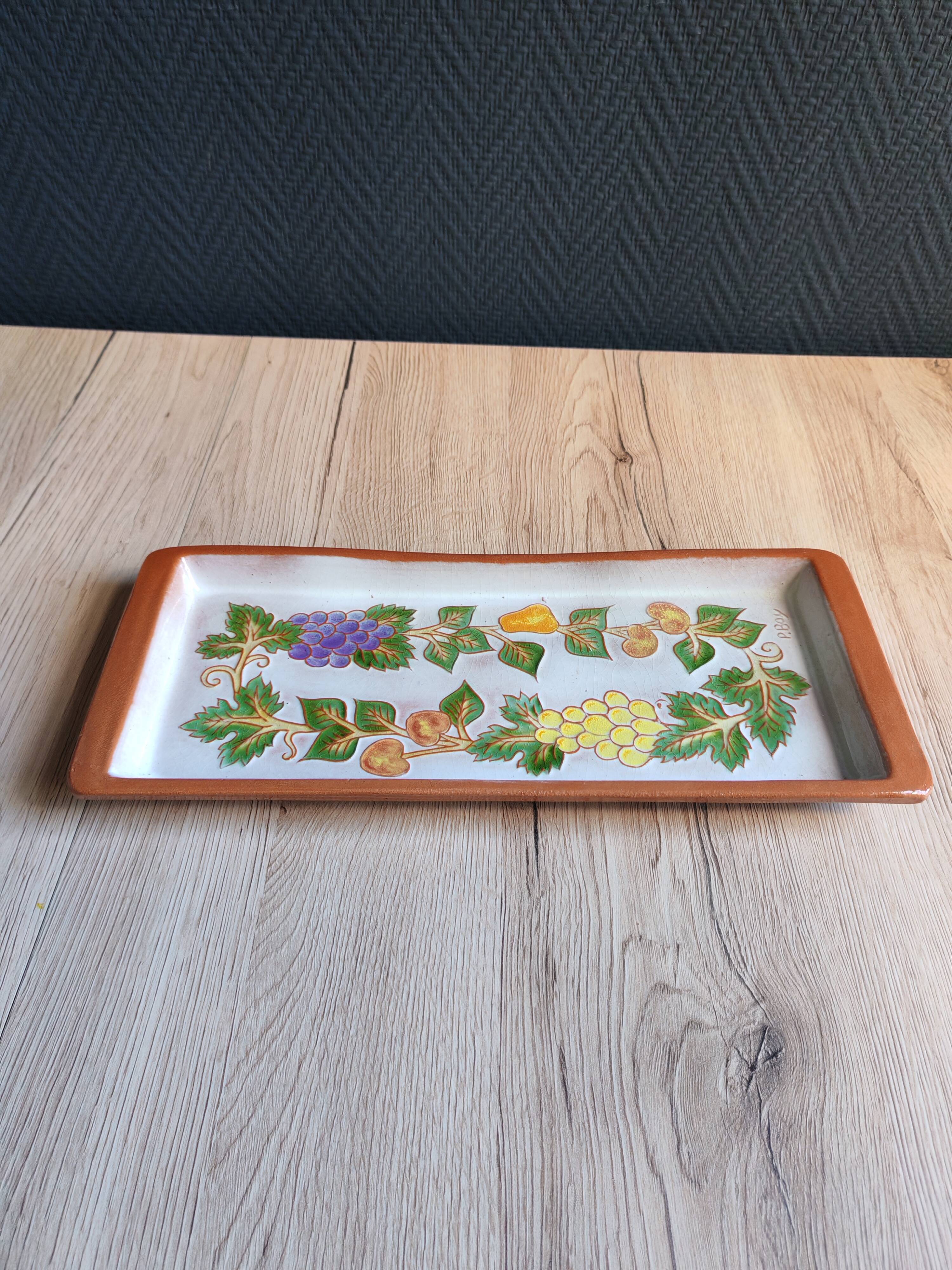 Terracotta plate signed P.Boy, glazed artisanal ceramics.