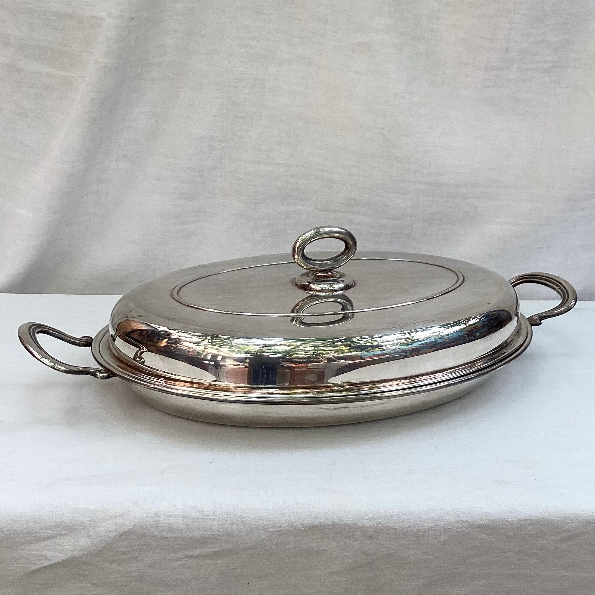 Silver metal covered dish signed Lancel dimension: height -14cm- width -48cm-
