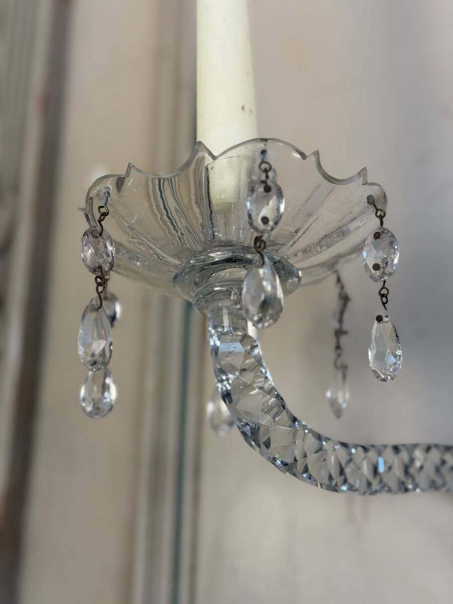 Pair of cut crystal wall sconces in the style of Maydwell and Windle, England, 18th century.