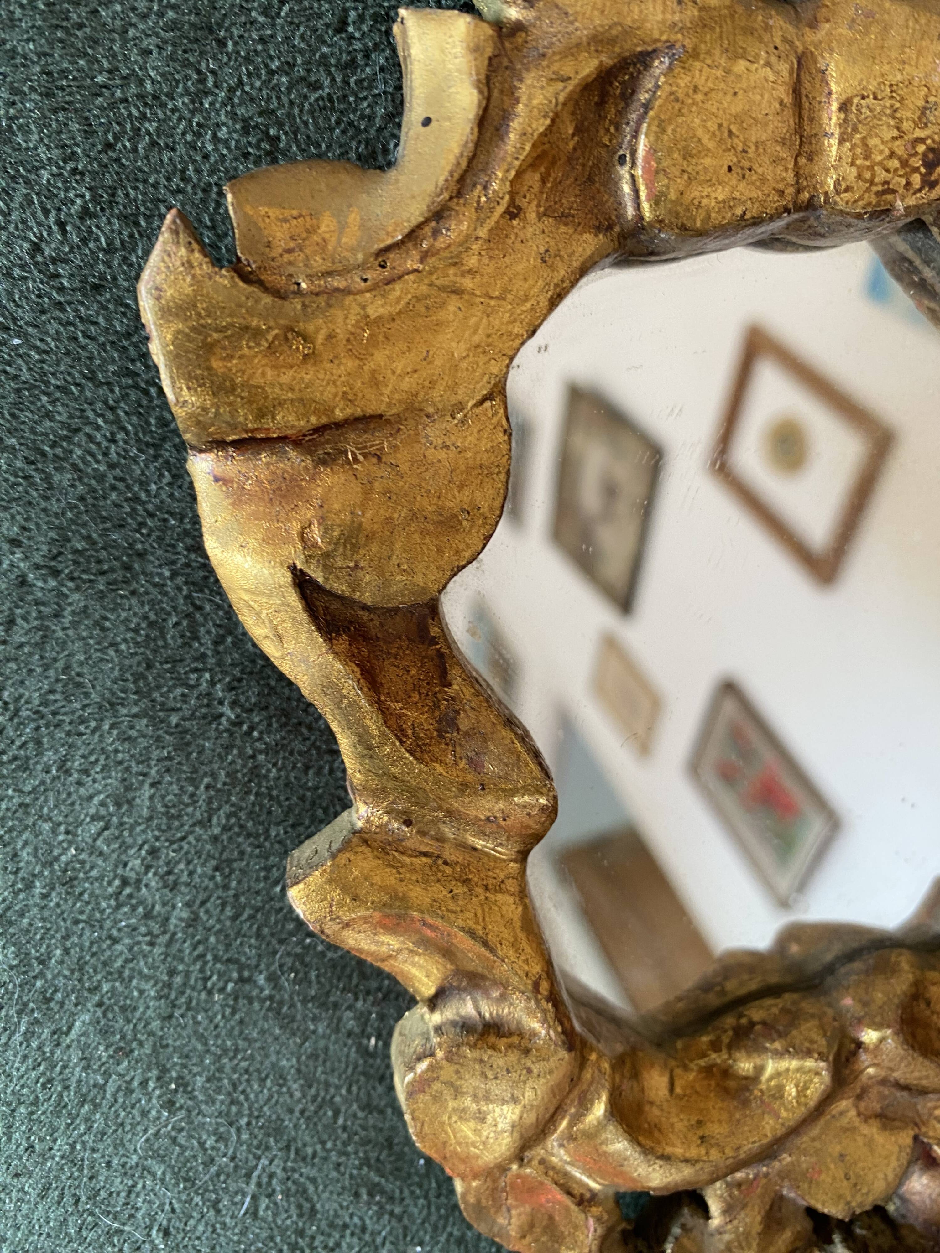 Small baroque gilded wood mirror.