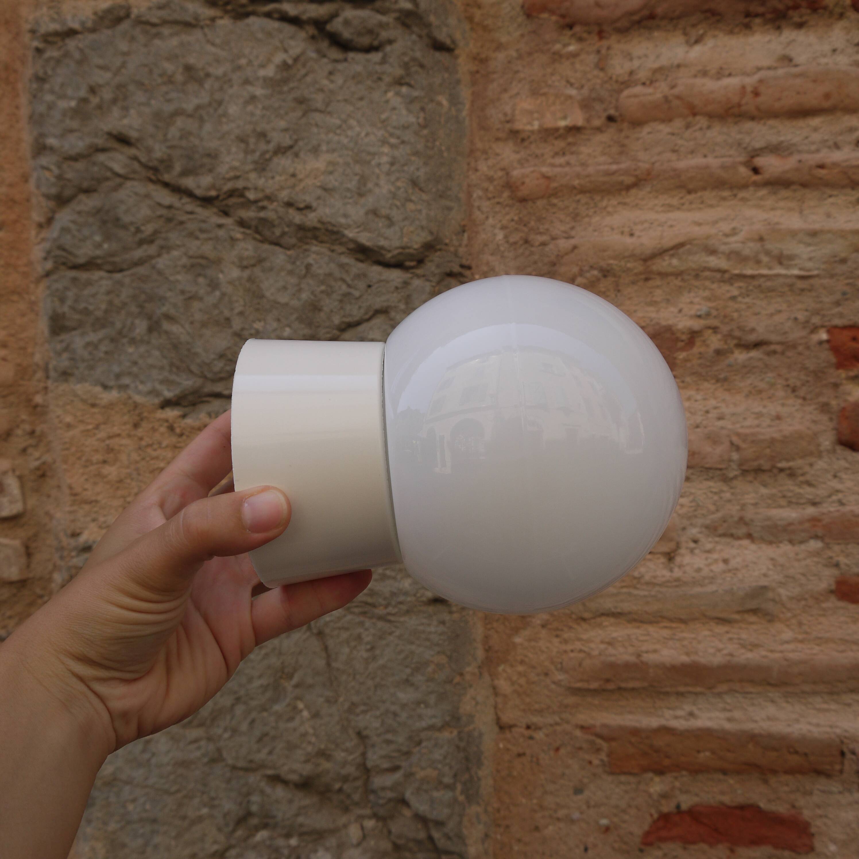 White globe sconce