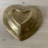 Empty bronze heart pocket