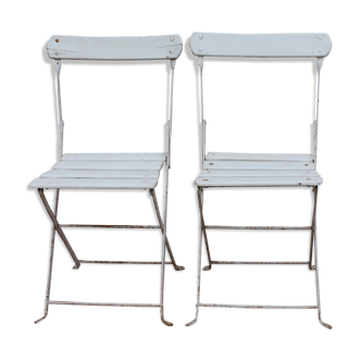 Pair of white folding garden chairs