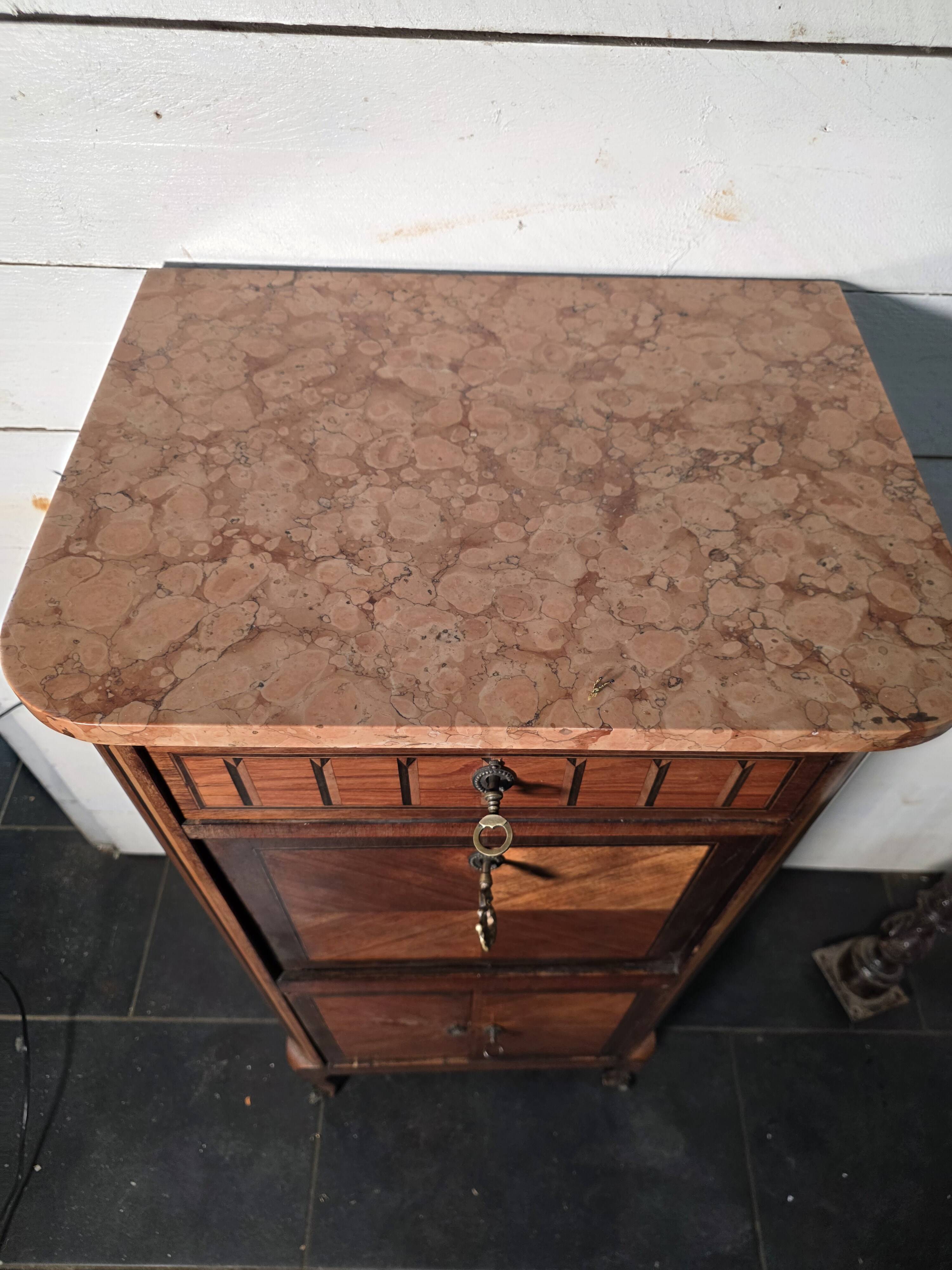 Louis XV style secretary with marquetry and marble top.