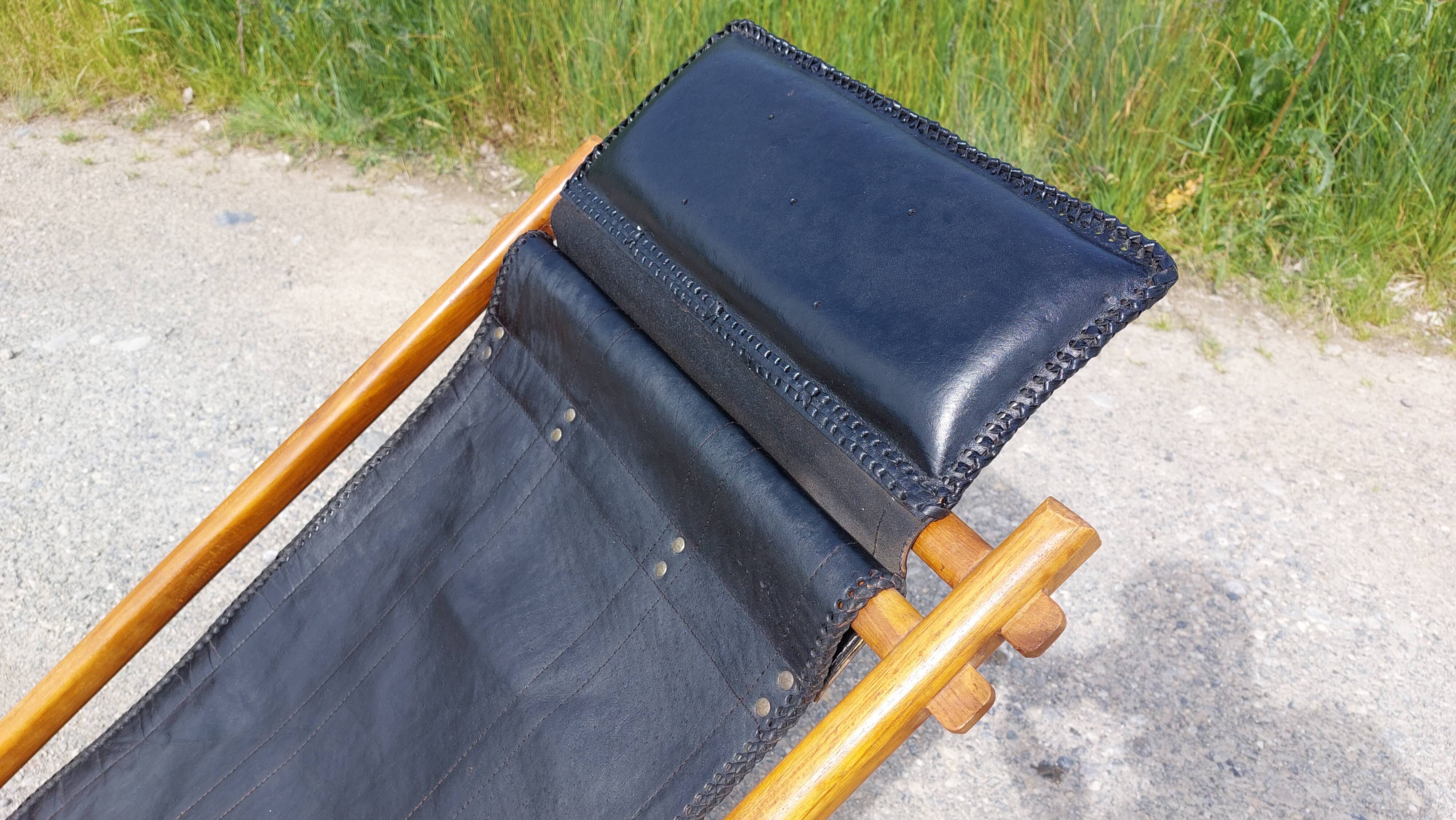 Old deckchair deck chair in wood and black leather - 40s