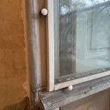 Window with interior shutters