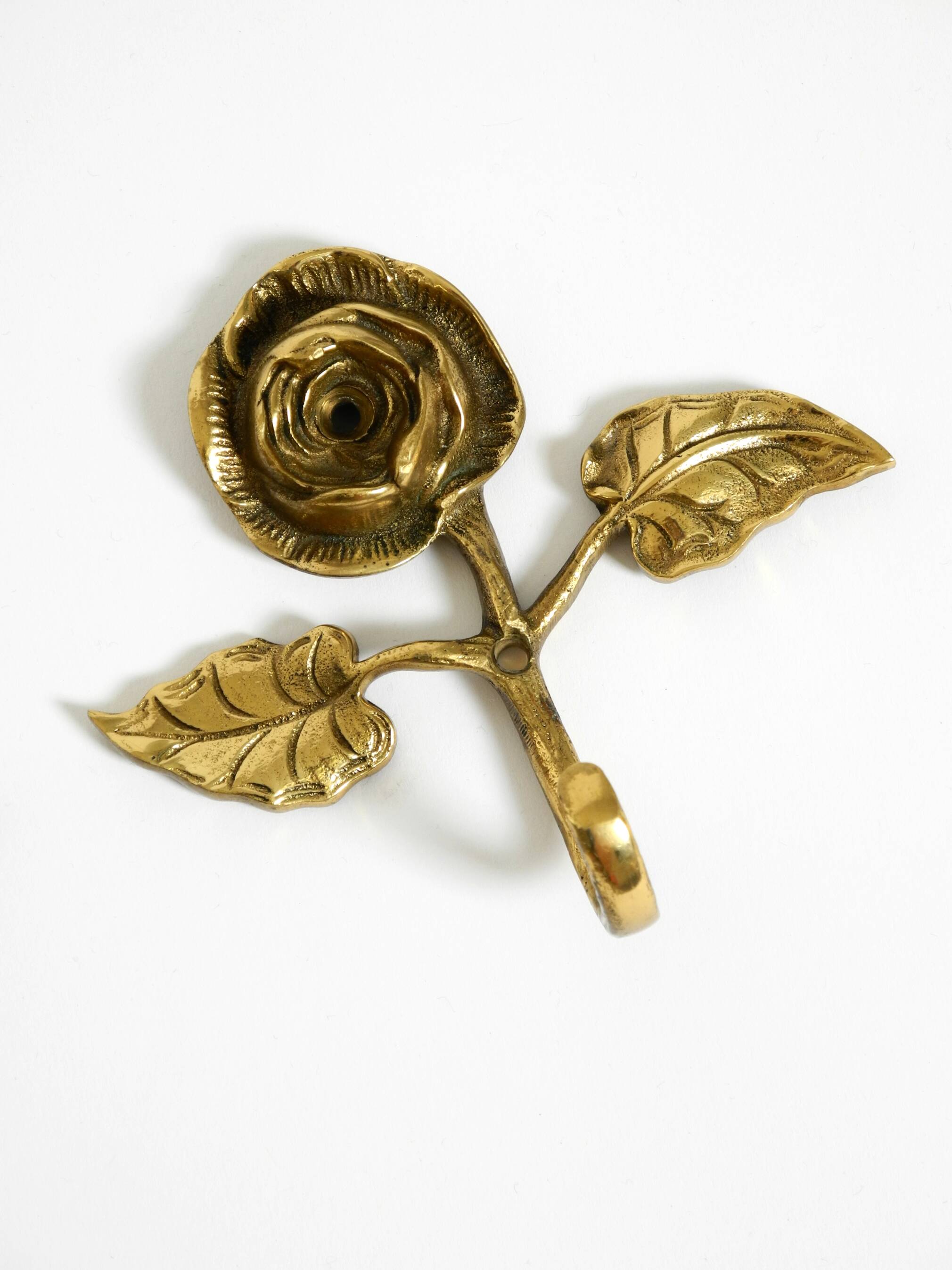 Set of five beautiful, solid mid-century brass rose wall coat hooks