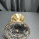 Brass candlestick in a fluted shape from the early 20th century.
