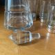 Liquor decanter in crystal and silver metal and matching glasses thereof