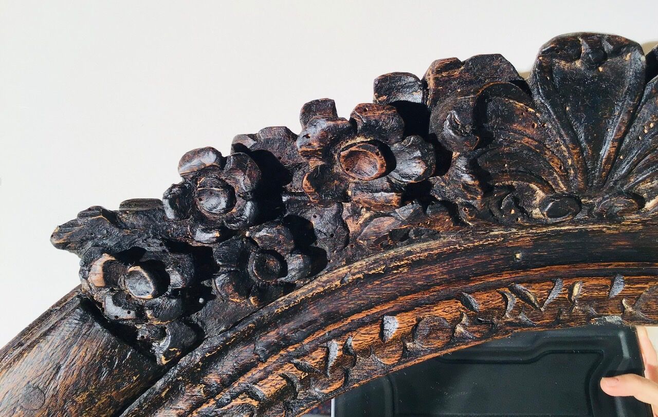 Oval mirror on an 18th century frame