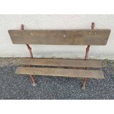 Bench with cast iron legs and branch decor